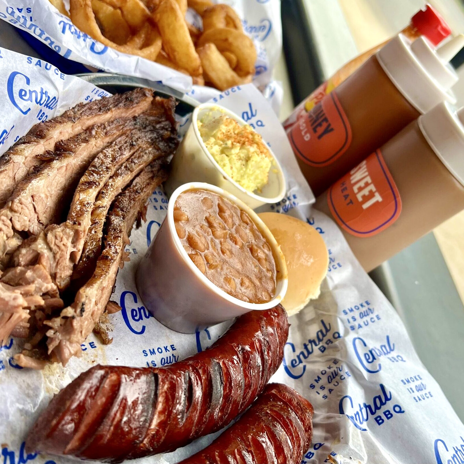 Pitt-Masters-combo-sausage-and-brisket-Brad-Blankenship-1-2186-scaled-square-6fc5d3c757a5093406648d048ccb215a-5ee0d2d5261d5 2