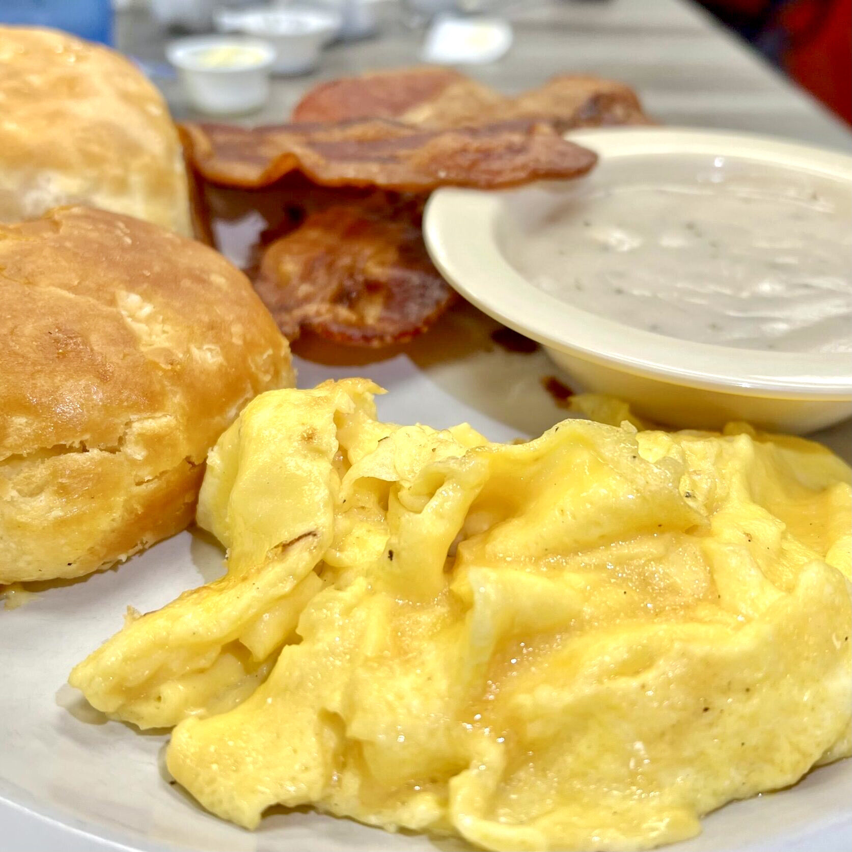 Scrambled-eggs-bacon-biscuits-and-gravy-Brad-Blankenship-1-2128-scaled-square-7893d548d53242dbaa5f4c871874528e-5ee0d2d5261d5 2